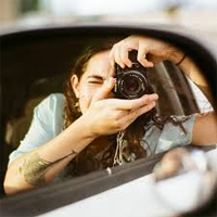 Annie Ersinghaus - woman using a camera