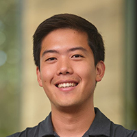 Brian Hie - smining man with dark hair