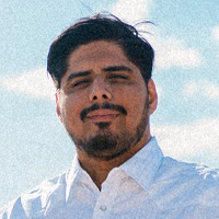 Gilberto Manzanarez - man with dark hair and beard