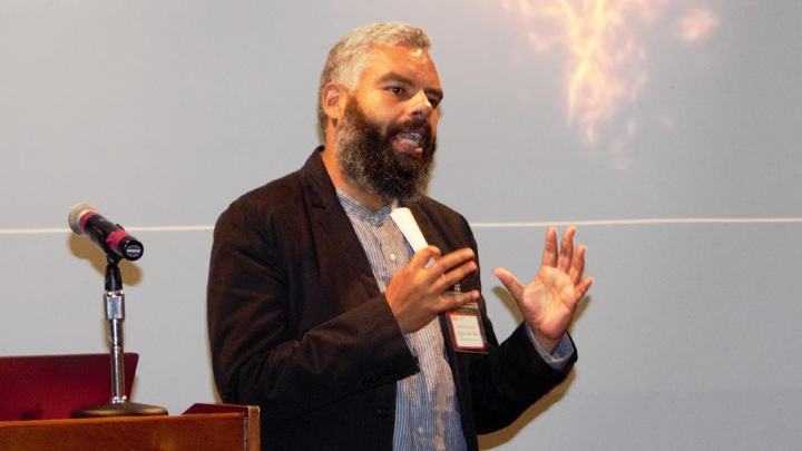 Visiting Brazilian Scholar Roberto Ivo Da Rocha Lima Filho speaks at SDSU’s Faculty Global Engagement Symposium & Awards event during 2024 International Education Week.