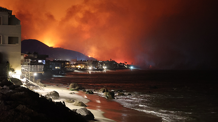 houses on fire near the beach