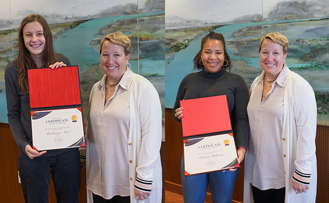 students with awards pose with dean