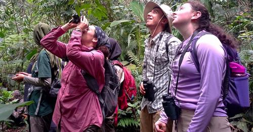 Erin Riley and students in Indonesian rainforest