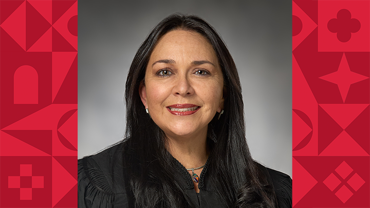 smiling woman with long dark hair