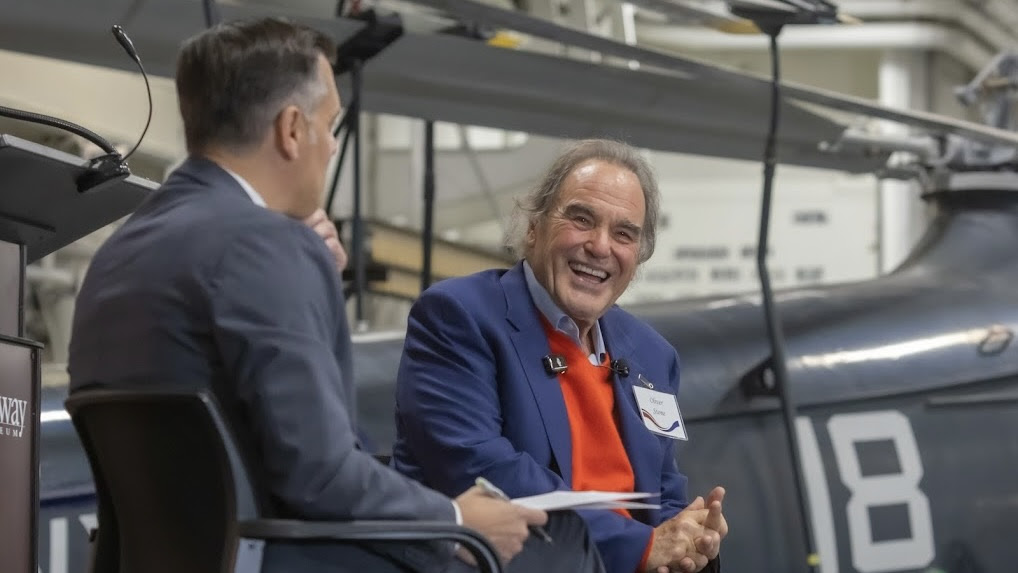 Greg Daddis, director of SDSU's Center for War and Society, and American film director Oliver Stone. 