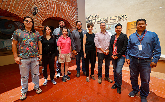 members of the team inside the archives